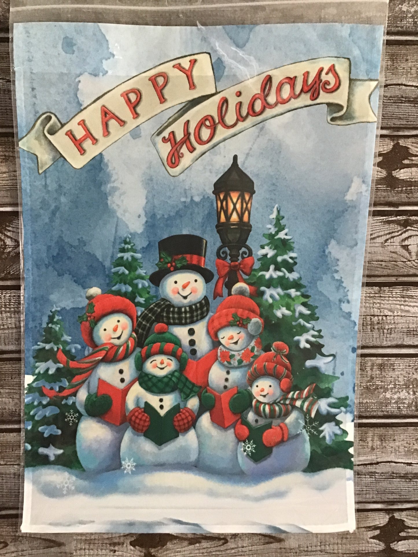 Happy holidays snowman carolers